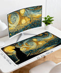 Starry Night Cat Desk Mat Extended Large 31.5 by 15.7 Inch Anime Mouse Pad on desk with computer monitor, lamp, plant.