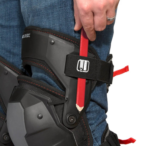 Impact Absorbing Gel Knee Pads With Thigh Stabilization For Flooring And Roofing Work Adjustable Comfort Lightweight TPE Gel Cushions Durable Poly Shell And 1680D Lining All Day Knee And Thigh Support being worn with a red pencil inserted in the strap.