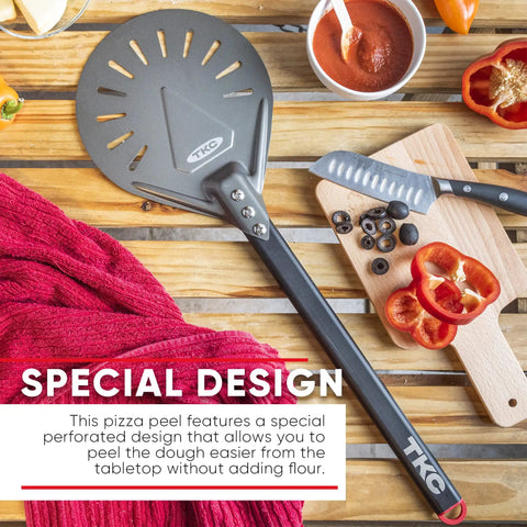 8 Inch Perforated Pizza Peel With Long Handle Aluminum Turning Peel For Indoor And Outdoor Pizza Making Lightweight Nonstick Pizza Turner For Oven Or Grill And Pizza Stone on wooden table with knife and chopped vegetables
