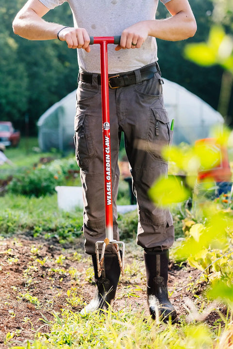 Person using Long Handle Garden Claw For Easy Weeding And Soil Aeration No Bend Tiller Cultivator Twist Weeding Tool in garden.