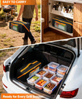 Person carrying 22 Inch Grill Tool Storage Bag With Dual Inner Compartments All In One Carryall For Grill Utensils Griddle And Barbecue Tools Black Heavy Duty 600D Polyester Water Resistant with barbecue items in a car trunk and storage cabinet.