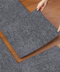 DIY 20x20 Carpet Tile Set With Self Adhesive Strips, Dual Color Light and Dark Gray, 0.16 Inch Pile being installed on wooden floor