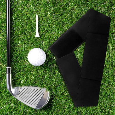 Golf Swing Arm Band Training Aid for Correct Posture and Stable Swing with club, ball, tee on grass
