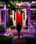 House decorated with Red White Blue Solar String Lights 39Ft With 60 LEDs Waterproof Patio Lights for Independence Day at night.