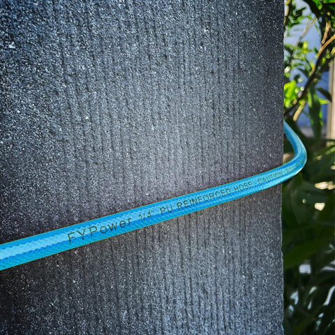 Quarter Inch X 100 Feet Reinforced Polyurethane Air Compressor Hose With 300 Psi Quick Connect Coupler And Plug Kit Blue on textured surface