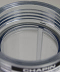Close-up of HydroFeed 32-Ounce In-Line Auto-Mix Fertilizer Injector System's clear tank and leak-free O-ring