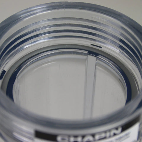 Close-up of HydroFeed 32-Ounce In-Line Auto-Mix Fertilizer Injector System's clear tank and leak-free O-ring