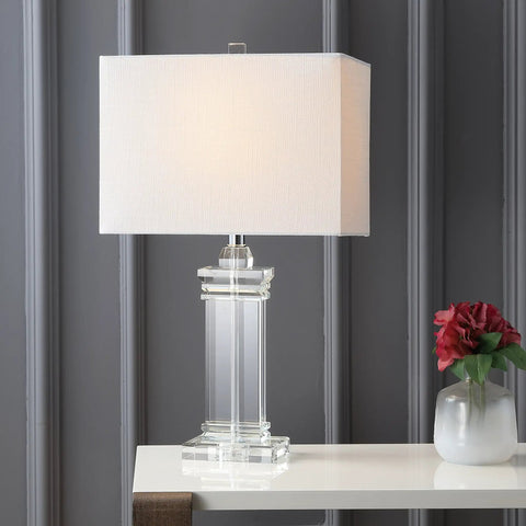 Ophelia Clear Solid Crystal LED Table Lamp With White Linen Shade, Modern Rectangular Column Design, displayed on table.