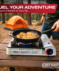 Dual Fuel Camp Stove With 4x 8oz Butane Canisters, 12,000 BTU Portable Stove used for camping with pan cooking chicken in forest