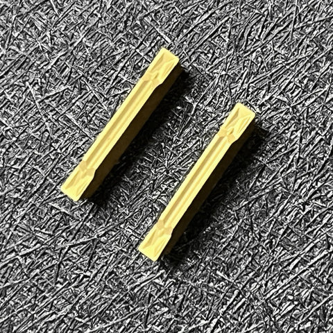 10-Piece Pro Grade MGMN200-G Carbide Inserts For Internal Turning, shown up close on textured background