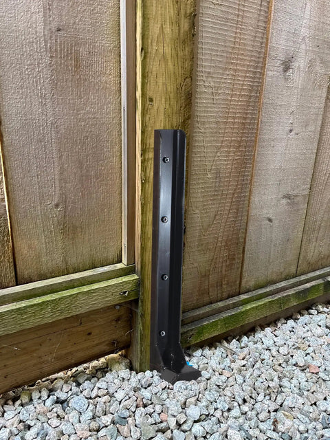 Heavy Duty Fence Post Repair Kit For 4x4 And 6x6 Wood Posts With One Piece Post Brackets, shown installed on wooden fence