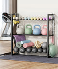 Heavy Duty 3 Tier Dumbbell Rack For Home Gym Featuring Adjustable Width Shelves Holds Up To 390 Pounds with weights and kettlebells.