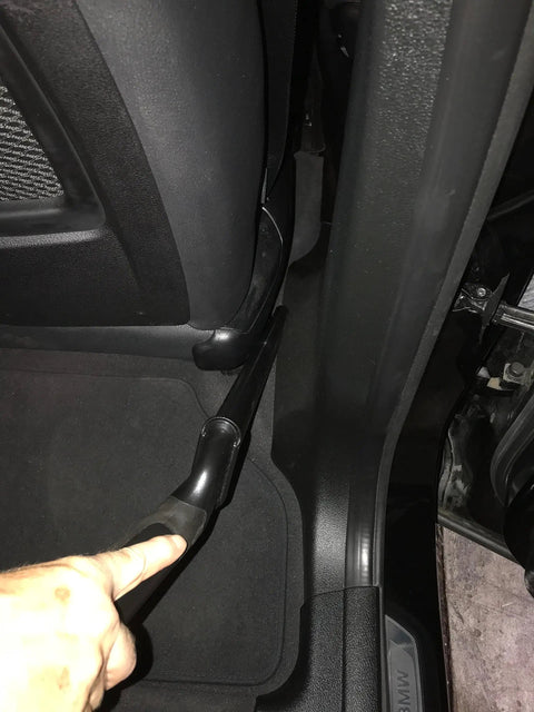 Hand using Shop Vacuum Garage Kit With 30 Foot Commercial Grade Hose for car cleaning, showcasing non clog airflow and flexibility.