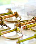 PTO Pin Set 20 Piece Assortment with round pins, tempered spring steel, yellow zinc plated, for power take off hubs and implements.