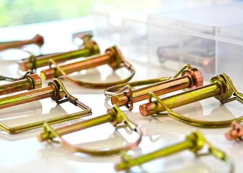 PTO Pin Set 20 Piece Assortment with round pins, tempered spring steel, yellow zinc plated, for power take off hubs and implements.