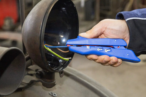 3-In-1 Automatic Wire Stripper And Ferrule Crimper With Side Cutter For 10-20 AWG, Self-Adjusting Stripping in use by electrician