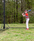 Heavy Duty Baseball and Softball Batting Cage With Wheels For Backyard Driveway And Club Training Commercial Grade Portable Cage Built Tough Steel Frame Premium Netting Easy Setup 40 Ft Practice Space with young player inside