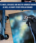 Person using Built Tough 10 Footer Nylon Braided Airbrush Hose With Soft Silicone Core for custom painting on canvas.