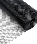 Tough As Nails 24 Inch X 50 Feet Black PVC Coated Chicken Wire Fence Heavy Duty Galvanized Hardware Cloth Roll on a flat surface