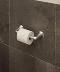 Elm 4 Piece Wall Mounted Bathroom Hardware Set In Satin Nickel Finish With Towel Bar Hand Towel Ring Robe Hook And Toilet Paper Holder Top Notch Style And Easy Install featuring toilet paper holder on dark tile wall.