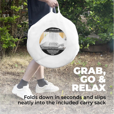 Person carrying Pop Up Mosquito Net For Bed And Camping Indoor Outdoor Bug Mesh Shelter in round white bag