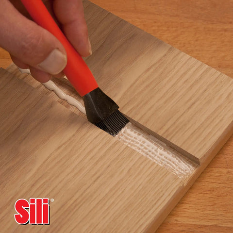 Silicone Glue Brush With One Inch Tip For Woodworking And Crafts applying glue on wood, shows easy clean up and no mess glue application.