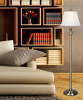 Metal Floor Lamp 60 Inch Antique Brass Finish With Cream Geneva Fabric Bell Shade 3 Way Switch in living room setting