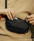 Person holding Ultralight Terra Shell Packing Cube Weatherproof Luggage Organizer With Strap Attachment Points Size S