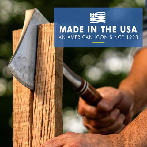 Sportsman's Axe 14 Inch Hatchet For Camping And Outdoors with forged steel blade slicing wood, showing leather grip in use