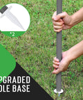 Hands setting up pole for Outdoor Badminton Net Set For Backyard And Beach Play With A Dope 20 Foot Long 3 Foot High Anti Sag Net