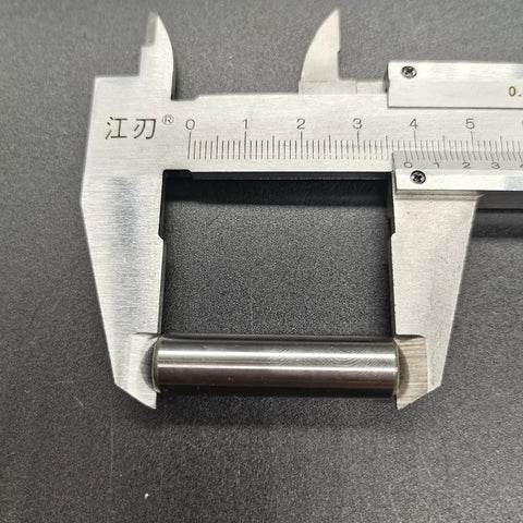 Close-up of caliper measuring piston pin from Piston Pin Kit With Clips And Needle Bearing For 66cc And 80cc 2 Stroke Gas Powered Bikes