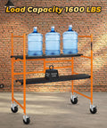 Tough As Nails 5 Inch Scaffolding Wheels Set Of Four Swivel Casters With One Inch Round Stem Dual Lock For Industrial Platform Towers 440 Pound Capacity Workhorse Rig on a portable shelving unit with water bottles.