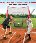 7x7 Foot Baseball Net With Batting Tee For Backyard Hitting And Pitching Practice shown with batter and coach on field