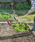 Person using Rotary Cultivator Garden Tiller With Adjustable Stainless Steel Handle, Ultra Lightweight Aluminum Tines And Wheels