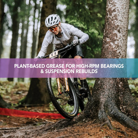 Cyclist on muddy trail riding using Plant-Based Bike Grease for Suspension and Components, Bombproof High-Performance Lube for Ceramic Bearings