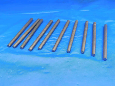 Rock Solid Taper Pins Pack Of Ten Size Five Diameter Four Inch Overall Length Heavy Steel laid out on blue background.