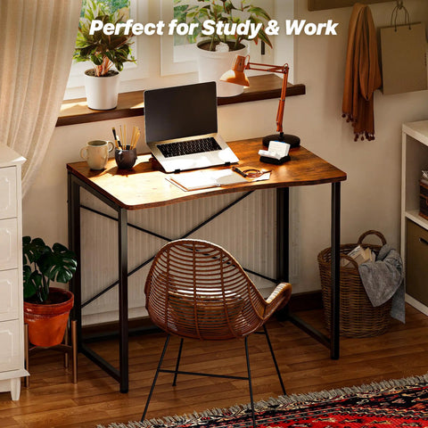 Compact Foldable Computer Desk For Small Spaces 31.5 Inch Rustic Brown Writing Table For Home Office Study Dorm And Bedroom Easy To Fold Space Saver Ideal For Tight Corners And RV Living in a cozy home office setup.