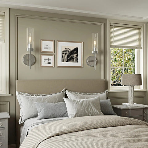 Seasonize Sand Nickle Battery Operated Wall Sconce Set of 2 mounted beside pictures in a cozy bedroom setting.