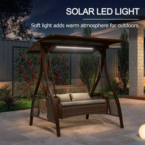 Patio Porch Swing Chair For Two With Canopy Handwoven Wicker Outdoor Glider With Solar LED Light Cushions in garden setting