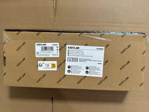 Front view of KRETLAW grease gun kit box (14 oz, 7000 PSI), brown cardboard with white label stickers.