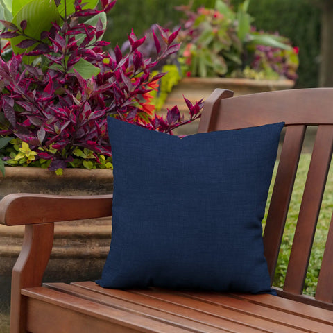 Outdoor Toss Pillows Set Of 2 16 By 16 Inches All Weather Rain Proof Fade Resistant Sapphire Blue Cushions on a bench