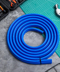 Blue coiled Five Eighth Inch T Slot Cover For Milling Machine Flexible Silicone Rubber Dust Shield on workbench