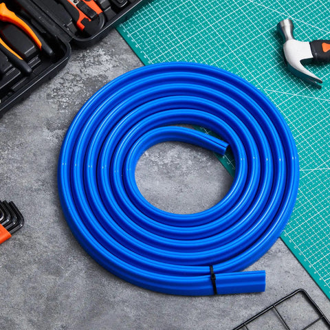 Blue coiled Five Eighth Inch T Slot Cover For Milling Machine Flexible Silicone Rubber Dust Shield on workbench