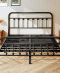 Queen Size Metal Bed Frame With Chic Victorian Headboard And Footboard Built Tough Like A Tank Skip The Box Spring Hassle Free Setup Plenty Of Under Bed Storage Black in a stylish bedroom.