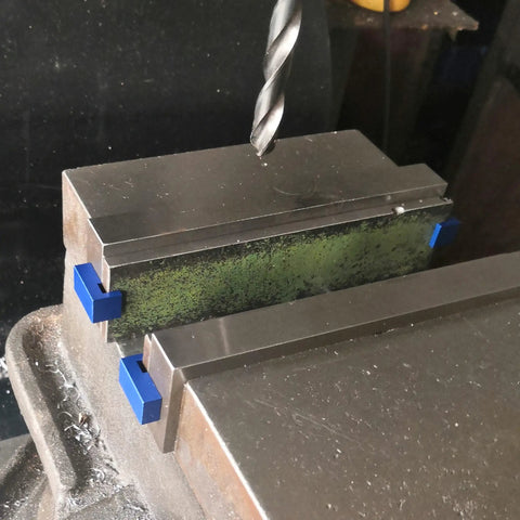 Magnetic Parallel Keepers for Vise and CNC Machining with blue powder-coated aluminum, ultra strong rare earth magnets attracting chips