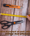 Hands using tape measure on wood surface with utility knife and scissors from 39 Piece Home Tool Set With Plastic Toolbox Storage Case Orange For DIY Projects And Everyday Household Repairs Includes Hammer Pliers Screwdrivers Tape Measure And More With Sturdy Heat Treated Chrome Plated Tools