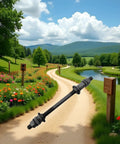 190mm black bike axle for rear hub three eighths inch 26 TPI shaft with conical lock nut on outdoor path background.