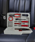Roadside Emergency Car Kit With 30 Piece Road Trip Essentials Tool Set Including Jumper Cables, Tire Pressure Gauge, Gloves, Electrical Tape, And Carrying Case For Car, Truck, Or RV Gray Red open on car seat
