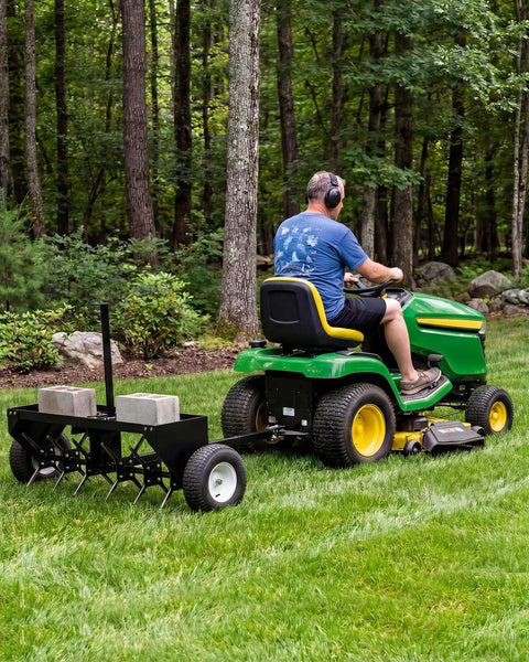 Heavy Duty 48 Inch Tow Behind Plug Lawn Aerator With Universal Hitch Deep Soil Penetration Steel Tines Tray And Inflatable Wheels