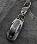 Tesla Key Fob Cover With Keychain Grippy TPU Case For Model 3 Model Y Model S, shown clipped to jeans pocket, highlighting its slim fit.
